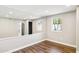 Finished basement with mirrored wall and hardwood floor at 9412 N 33Rd Way, Phoenix, AZ 85028