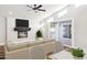 Living room with fireplace, hardwood floors, sliding glass doors to backyard at 9412 N 33Rd Way, Phoenix, AZ 85028