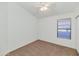 A bedroom featuring carpet flooring, a ceiling fan, and natural lighting at 10245 W Jessie Ln, Peoria, AZ 85383