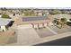 Single story home with solar panels and a large backyard at 10537 W Prairie Hills Cir, Sun City, AZ 85351