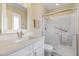 Bathroom with walk-in shower and white vanity at 10537 W Prairie Hills Cir, Sun City, AZ 85351