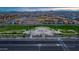 Aerial view of community with park and homes at 10550 E Sanger Ave, Mesa, AZ 85212