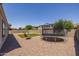 Large backyard with trampoline and artificial turf at 10550 E Sanger Ave, Mesa, AZ 85212