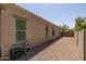 Side yard with gravel and exterior wall at 10550 E Sanger Ave, Mesa, AZ 85212