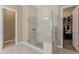 Spa-like bathroom with a walk-in shower and built-in shelving at 10550 E Sanger Ave, Mesa, AZ 85212