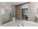 Bathroom with a large walk-in shower and barn door at 10550 E Sanger Ave, Mesa, AZ 85212