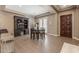 Dining area with built-in hutch and entry access at 10550 E Sanger Ave, Mesa, AZ 85212