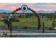 Disc golf course with colorful archway feature at 10550 E Sanger Ave, Mesa, AZ 85212