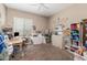 Home office featuring a desk, chair, and storage at 10550 E Sanger Ave, Mesa, AZ 85212