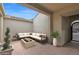 Relaxing outdoor patio with comfortable seating around a modern fire pit, perfect for entertaining at 10550 E Sanger Ave, Mesa, AZ 85212