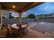 Covered patio with seating area and view of backyard at 10550 E Sanger Ave, Mesa, AZ 85212