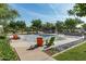 Community splash pad with seating and shade structures at 10550 E Sanger Ave, Mesa, AZ 85212