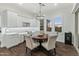 Bright breakfast nook with a round table and four chairs, perfect for morning meals at 10888 N 136Th Pl, Scottsdale, AZ 85259