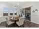 Breakfast nook with patio access, a round table and four chairs, and plantation shutters at 10888 N 136Th Pl, Scottsdale, AZ 85259