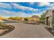 Front driveway and landscaping with mountain view at 10888 N 136Th Pl, Scottsdale, AZ 85259