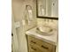 Updated powder room, featuring a unique vessel sink and wood vanity at 10888 N 136Th Pl, Scottsdale, AZ 85259