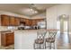 Modern kitchen with stainless steel appliances and an island at 11246 W Chase Dr, Avondale, AZ 85323