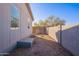 Backyard with wooden fence and gravel ground at 11275 N 99Th Ave # 188, Peoria, AZ 85345