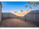 Brick paved backyard area with wooden fence at 11275 N 99Th Ave # 188, Peoria, AZ 85345