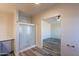 Clean bathroom with shower and access to bedroom at 11275 N 99Th Ave # 188, Peoria, AZ 85345