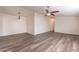 Dining room with wood-look floors and chandelier at 11275 N 99Th Ave # 188, Peoria, AZ 85345