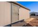 Exterior view of home's front door and security gate at 11275 N 99Th Ave # 188, Peoria, AZ 85345