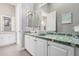 Bathroom with unique countertop, white cabinets, and vessel sink at 1211 W Sousa Ct, Anthem, AZ 85086