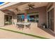 Outdoor patio with seating area, perfect for dining al fresco at 1211 W Sousa Ct, Anthem, AZ 85086