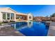 Inviting swimming pool with diving board and spacious backyard at 1211 W Sousa Ct, Anthem, AZ 85086