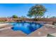 Relaxing pool area with diving board and plenty of space at 1211 W Sousa Ct, Anthem, AZ 85086