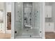 Large walk-in shower with marble finishes and dual shower heads at 1211 W Sousa Ct, Anthem, AZ 85086