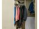 Well-organized closet with ample hanging space and shelving at 12923 W Ballad Dr, Sun City West, AZ 85375