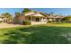 Back exterior view showing patio and landscaping at 12923 W Ballad Dr, Sun City West, AZ 85375