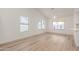 Light-filled dining area with hardwood floors and a stylish table at 1326 W Seascape Dr, Gilbert, AZ 85233