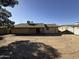 Rear view of the house showcasing a large yard at 14017 N 40Th Ave, Phoenix, AZ 85053