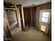 Unfinished bathroom with exterior access, ready for upgrades at 14017 N 40Th Ave, Phoenix, AZ 85053