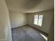 Simple bedroom with large window and ample space at 14017 N 40Th Ave, Phoenix, AZ 85053