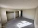 Large bedroom with a sizable closet, ready for new owners at 14017 N 40Th Ave, Phoenix, AZ 85053