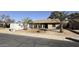 Ranch style home with mature landscaping and a spacious front yard at 14017 N 40Th Ave, Phoenix, AZ 85053