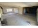 Large living room undergoing a complete remodel, showcasing potential at 14017 N 40Th Ave, Phoenix, AZ 85053