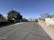 Residential street view showcasing neighborhood setting at 14017 N 40Th Ave, Phoenix, AZ 85053