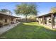 Large backyard with grassy area and covered patio spaces at 1432 E Lupine Ave, Phoenix, AZ 85020