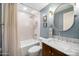 Spa-like bathroom with herringbone tile and modern fixtures at 1432 E Lupine Ave, Phoenix, AZ 85020