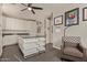 Laundry room with built-in cabinets and island at 15130 W Linden St, Goodyear, AZ 85338