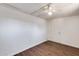 Bedroom with wood-look flooring and ceiling fan at 15202 N 26Th St, Phoenix, AZ 85032