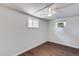 Bedroom with wood-look flooring and ceiling fan at 15202 N 26Th St, Phoenix, AZ 85032