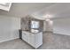 Kitchen island with granite countertop and white cabinets at 15202 N 26Th St, Phoenix, AZ 85032