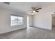 Bright living room with tile floors and large window at 15202 N 26Th St, Phoenix, AZ 85032