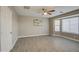 Bright bedroom with bay window and ceiling fan at 1633 S 171St Dr, Goodyear, AZ 85338