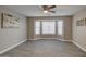 Spacious bedroom with bay window and ceiling fan at 1633 S 171St Dr, Goodyear, AZ 85338